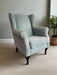 Wingback chair in grey durable fabric